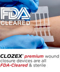 Emergency Laceration Closure Kit With Three Individually Packaged Closures applied on forearm wound with FDA Cleared label