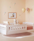 Twin Size Montessori Floor Bed With Safe Guardrails For Toddlers, White Wood Frame in kid-friendly room