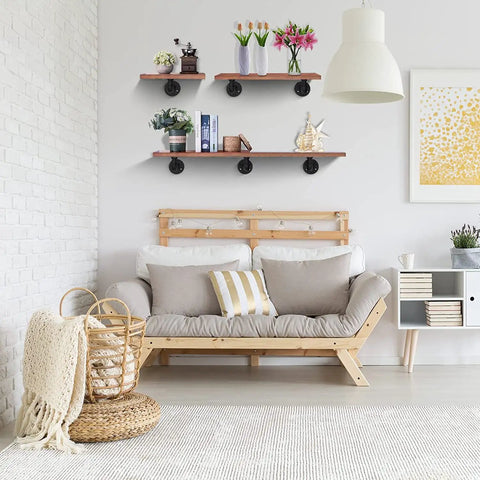 Living room with wooden couch and Vintage Black Iron Pipe Shelf Brackets 12 Pack Wall Mount Shelving for Rustic Home Decor Dope Industrial Look Built Tough for Kitchen Bath Bedroom Library with Hardware Included