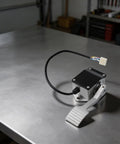 Heavy Duty Metal Throttle Foot Pedal For Golf Cart And Electric Vehicle with connector and waterproof housing on silver surface.
