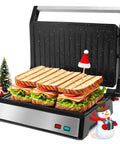 Aigostar 1200W Panini Press Sandwich Maker With Ceramic Non Stick Plates Opens 180 Degrees For Indoor Grilling, silver appliance with grilled sandwiches.