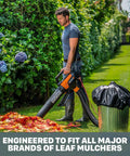 Man using Universal Fit Leaf Collection System for Leaf Blowers and Vacuums, 5-Inch Tube, Mesh Hood, Big Capacity WA4058 in garden.