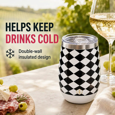 Premium Double Wall Insulated Stemless Wine Tumblers With Slider Lids 12 Oz Set on a table with snacks outdoors.