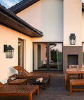 Outdoor Sconce Lights Wall Fixtures For Front Porch And Patio Yard With Glass Panels Aluminum Exterior Lanterns Waterproof Weatherproof And Rust Resistant Build No Fuss Install 2 Pack Black on a modern patio wall.