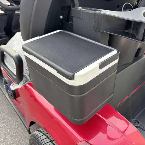 Top Shelf Two Seater Electric Golf Cart Equipped With A Dependable 48V Lithium Battery And Punchy Lightweight Frame For Sweet All Terrain Cruising In Fiery Red. Storage compartment on the side.
