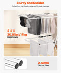 Heavy Duty Two Tier Clothes Drying Rack With 31 Sturdy Rods And Sock Clips Foldable Metal Laundry Stand Adjustable Height For Indoors Or Yard No Sweat Dry Setup showing socks and towels hanging.
