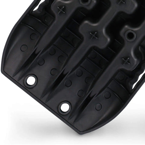 Close-up of black Heavy Duty Recovery Tracks for 4x4 Off Road Adventures Traction Boards with U design for sand and mud.