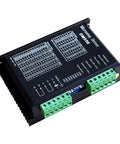DM556 microstepper driver module for CNC; black enclosure with two green terminal blocks.