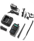 UV 5R 8W Dual Band Two Way Radio with earpiece, antenna, charger, battery, and accessories on white background