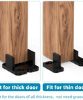 Eight Piece Barn Door Floor Guides Set For Sliding Doors Bottom Mount Floor Track And Closet Hardware Plastic Wall Mounted Guides With Bypass And Pocket Options Includes Screws Black Finish shown installed on thick and thin door