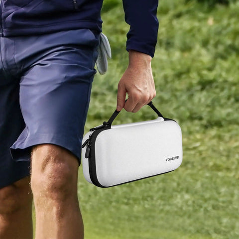 Person carrying Hard Shell Golf Glove Case With Removable Glove Shaper Protective Organizer For Balls Tees And Markers