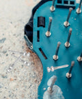20 Pack Lawn Spikes For Aerator Shoes, Nail Soil Spikes For Lawn Aeration on a blue metal sandal