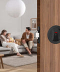 Matte Black Pocket Door Lock Set with Privacy Indicator for sliding and pocket doors shown installed on a wooden door.