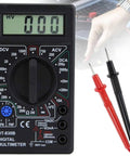 Pocket Size Digital Multimeter With LCD Auto Range For Voltage AC Voltage Current Resistance Diode Transistor Battery Testing Handy Lightweight Tool For Pros And DIY Enthusiasts on workbench