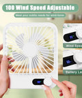 Hands adjusting the Six Point Eight Inch Portable Personal Desk Fan With Rechargeable Battery Adjustable Zero To One Hundred Speed Control LED Real Time Speed Display Quiet Sleep And Desk Fan For Office Bedroom Travel On Cruise Ships Or Beach Vacations