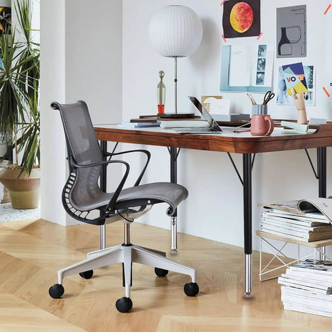 Top Shelf Adjustable Height Table Legs Set Of Four Black Modern Stainless Steel Office And Activity Desk Hardware Heavy Duty Replacement Base Built Different Slick Finish with a gray office chair and wooden desk.