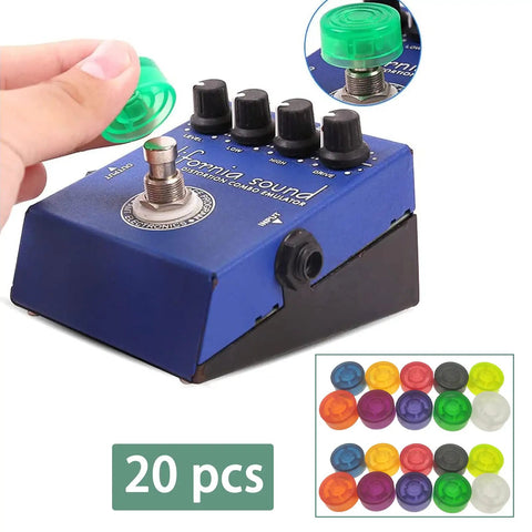 Guitar Pedal Footswitch Topper Set 20 Pack Multi Color Protection Caps on blue pedal with hand placing green PVC cap
