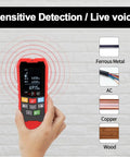 Hand holding a red Heavy Duty 4 In 1 Wall Scanner, displaying live detection readings for metals and wood.