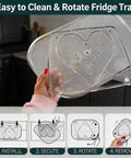 Person holding heart-shaped Two Pack Clear Acrylic Fridge Lazy Susan Organizer with 360 Degree Rotating Turntable in kitchen