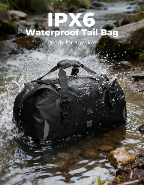 Waterproof Motorcycle Dry Bag Tail Pack Duffle Luggage 40L splashing in river with quick release straps, rugged black design.