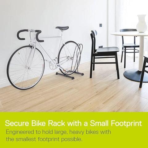 Side view of Two Pack Adjustable Floor Bike Stands For Mountain, Fat Tire And Road Bikes, holding a road bike in a room.