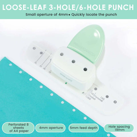 3 Hole Paper Puncher With Ergonomic Handle Grab And Go Portable Desktop Binder Punch for A8 A7 A6 A5 notebooks on a desk