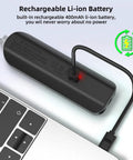 Rechargeable digital multimeter battery charging via USB cable next to laptop with NCV tester and alarms, auto-ranging AC/DC