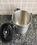 Rock Solid 304 Stainless Steel Coffee Canister Featuring One Way Degassing Valve And Rotatable Date Tracker Keeps Your Daily Grind Fresh And Legit Snap Tight Airtight Tea Storage Container, interior view with black lid open.