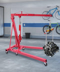 Heavy Duty Folding Hydraulic Engine Hoist And Crane, 2 Ton Capacity With Portable Wheels, Includes Engine Leveler Bar in garage setting.