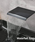 Wall Mount Bathtub Filler Faucet with Waterfall Flow, matte black finish, showcasing water flow into a tub.