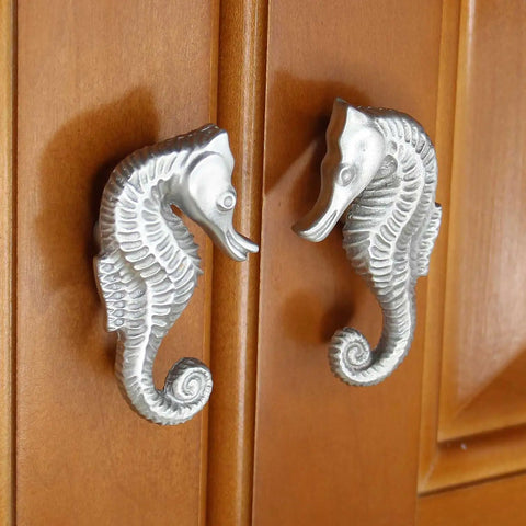 Coastal Seahorse Cabinet Knobs Set In Brushed Nickel Finish Small Matched Pair on wooden cabinet