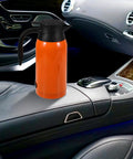 Road Ready Portable Car Electric Kettle Water Heater With Roomy 1000 Ml Stainless Steel Build on car console for convenient hot drinks.