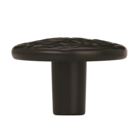 Heavy Duty Vintage Round Cabinet Knob With Classic Colonial Black Finish And 1.25 Inch Diameter Straight Fire Upgrade For Kitchens And Pantries. Close-up view.