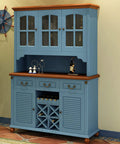 Blue cabinet with glass doors and wine storage, wooden top, displayed in a cozy room with nautical decor and plant.