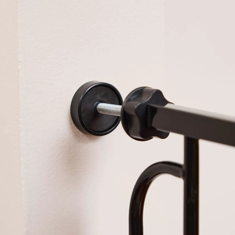 Close-up of black Extra Wide Baby Gate 29 To 49 Inches For Doorways And Stairs, Pressure Mounted Safety Gate With Door part.