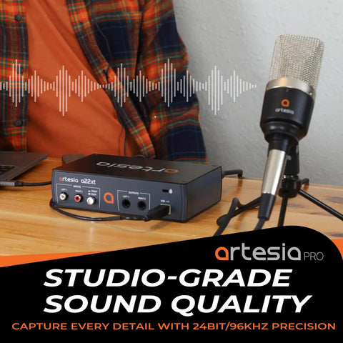 A22XT USB Audio Interface With 24Bit 96kHz Recording And 48V Phantom Power XLR Input for mic and instrument on a desk setup.