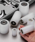 4 Pack Plastic Roller Wheels With Bearings 6mm ID 20mm OD 40mm Length Guiding Belt Idler White shown with a toolkit
