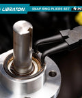 Pro Grade 7 Inch Snap Ring Pliers Set For Internal And External Circlips being used on a metal component
