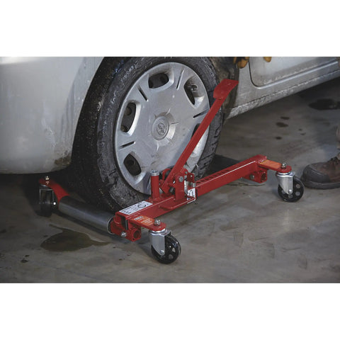 Heavy Duty Mechanical Wheel Dolly With Hands Free Pedal Lift Crushing Up To 1250 Lbs Rock Solid Steel Frame Smooth Rolling Casters Top Shelf Garage Essential For Easy Street Car Transport