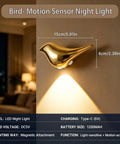 Super Sleek Bird Motion Sensor Wall Light With Heavy Duty Rechargeable Battery 2 Pack mounted on a wall with golden finish.
