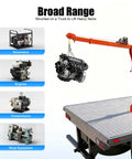 Heavy Duty Truck Mounted Crane Hoist With 1100 Lb Capacity And 12 Volt Electric Winch lifting engine on pickup truck bed.