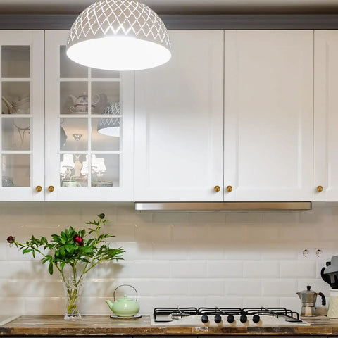 Modern kitchen with white cabinets featuring round dresser knobs and cabinet knobs sleek ball shape kitchen hardware 0.95 inch antique brass zinc alloy durable 12 pack easy install for cabinets drawers and furniture modern minimalist style.