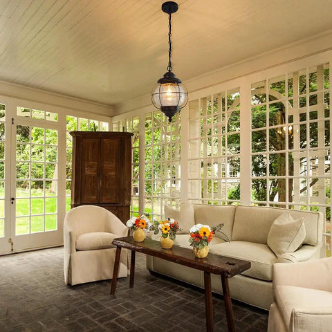 Outdoor Pendant Lights With Farmhouse Style Black Metal Hanging Porch Fixture And Clear Bubbled Glass Globe Inside An Iron Cage Frame