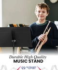 Young musician with trumpet next to Durable Sheet Music Stand For Musicians Pro Grade 48 Symphony Model Adjustable Height 26-48 Inches.