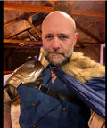 Man wearing Beefy Steel Armor Pauldron For Gladiator Cosplay And Larp Knight Handcrafted Metal Shoulder Armor Piece