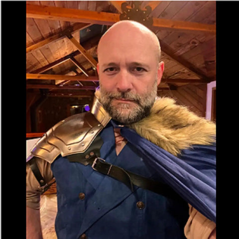 Man wearing Beefy Steel Armor Pauldron For Gladiator Cosplay And Larp Knight Handcrafted Metal Shoulder Armor Piece