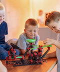 Children enjoying the Dynamic XM Construction Set Multi with 280 Parts for Marble Run Builds, featuring rotary funnel and launch pad.