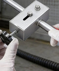 Close-up of Pro Grade Wall Wiring Machine And Cable Hidden Pipe Threading Tool with steel components for electrical installations.