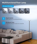Bright Sky Led Modern Torchiere Floor Lamp With 71 Inch Tall Aluminum Pole shown in a living room next to a sofa