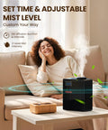 Chill Out Your Space With This Waterless Essential Oil Diffuser Featuring Smooth Bluetooth App Controls And Epic Five Thousand Square Foot Range For Massive Living Rooms Or Busy Offices So Lowkey Silent Cold Vapor Tech Holds Bold Scents Crisp And Dry in a cozy living room with adjustable mist.